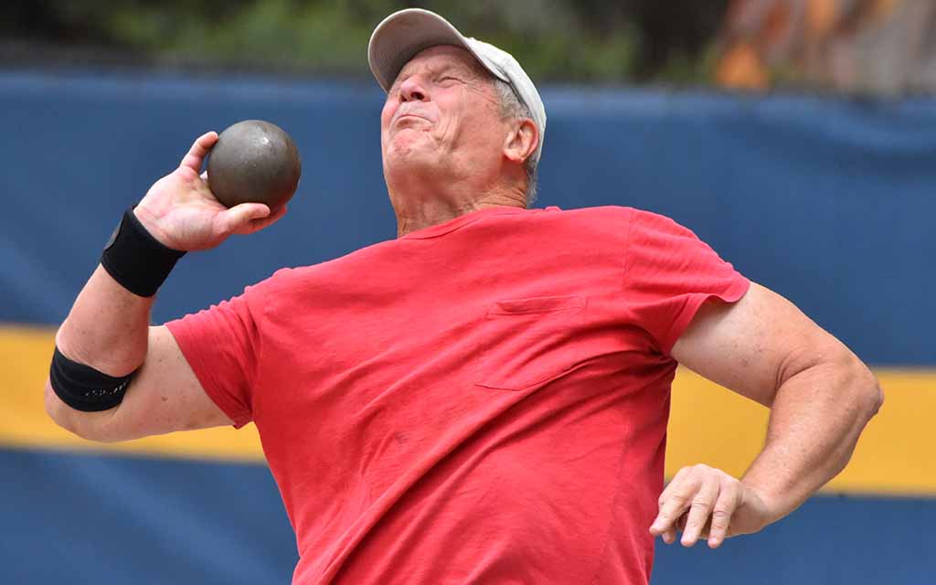 Quenton "Doug" Torbert, 65, won the 11-pound shot put at 52-3 1/4, short of his age-group world record of 54-8 in May. Photo by Ken Stone