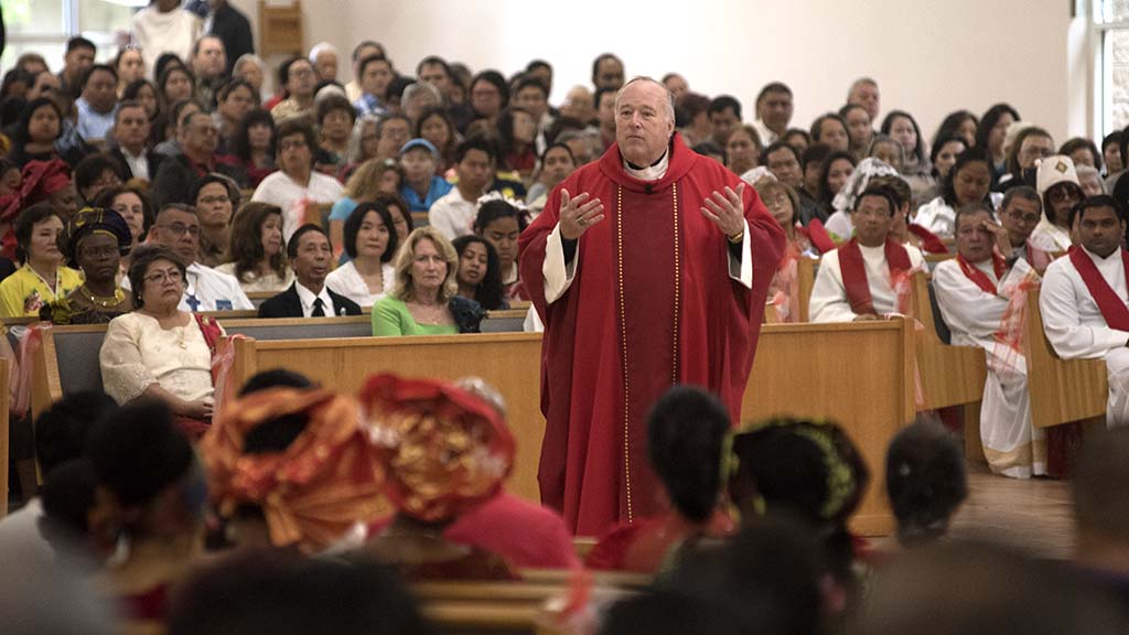 San Diego Bishop Robert McElroy preaches to about 1,400 parishioners from around the county.