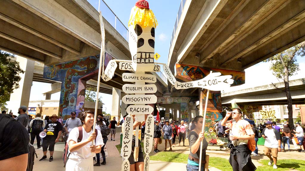 Puppets and this skeleton were carried in the march to the federal building in downtown San Diego.