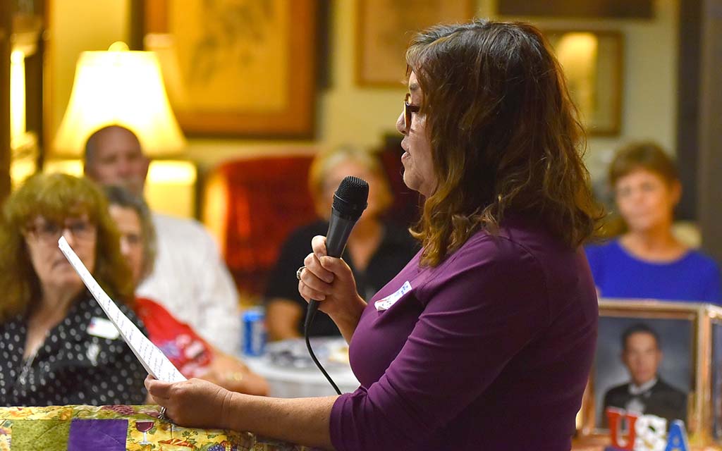 Marjorie Blakeney Swan, whose father fought in three wars, reads from her son's poem "Ode to the Fallen Soldier of Iraq."