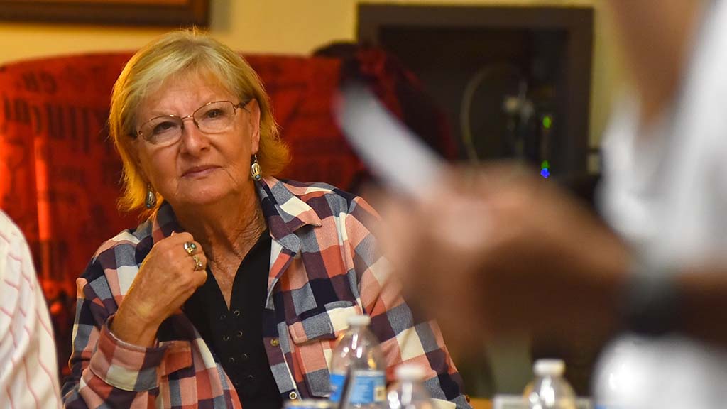 An Republican women's club member listens to Hunter read from a submitted question.