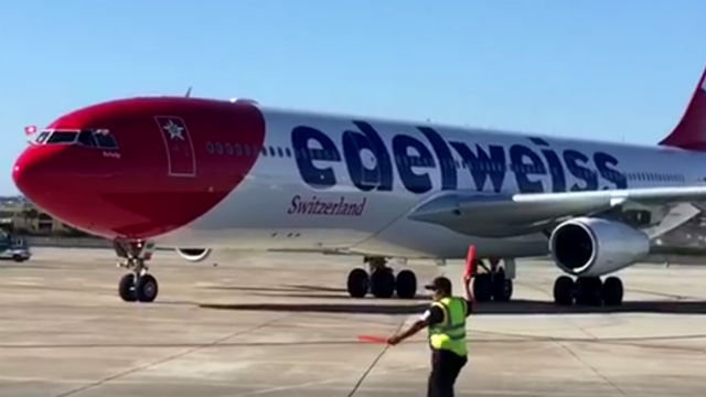 A Swiss airliner lands at San Diego International Airport