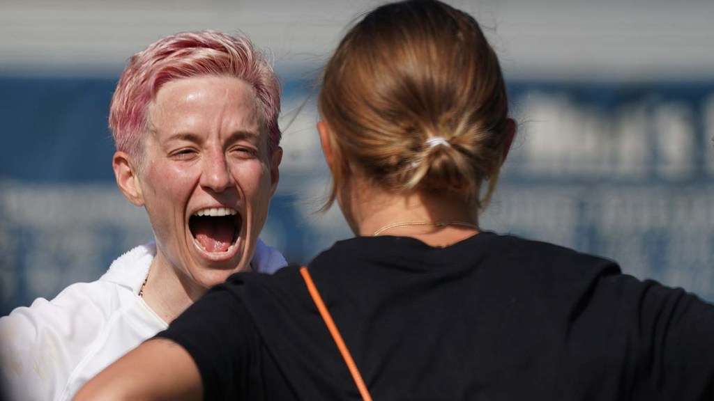 Soccer Legend Megan Ripinoe laughs while talking to Abbie Dahlkemper after the match. Photo by Chris Stone