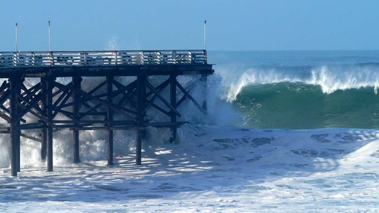 12 Foot High Waves From Storm Appear To Damage Ocean Beach Pier