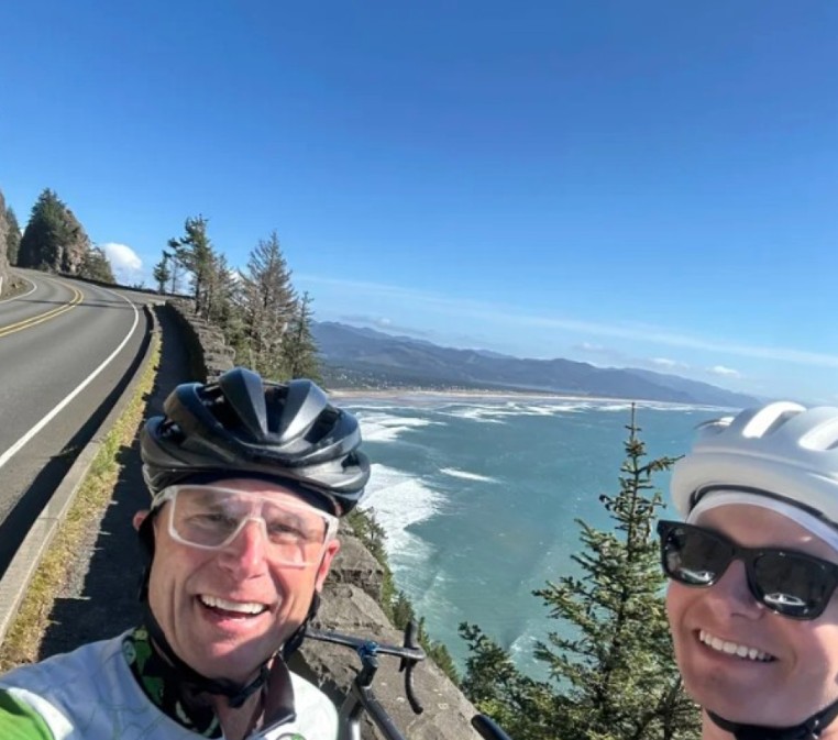 Father-son duo drop by Petco Park, the latest stop on their ballpark bike tour to fight childhood cancer