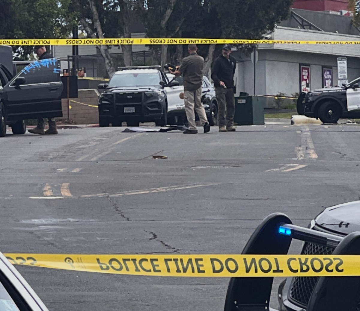 Streets blocked, evacuations follow after motorist found with Nazi flag, canister near site of mosque attack