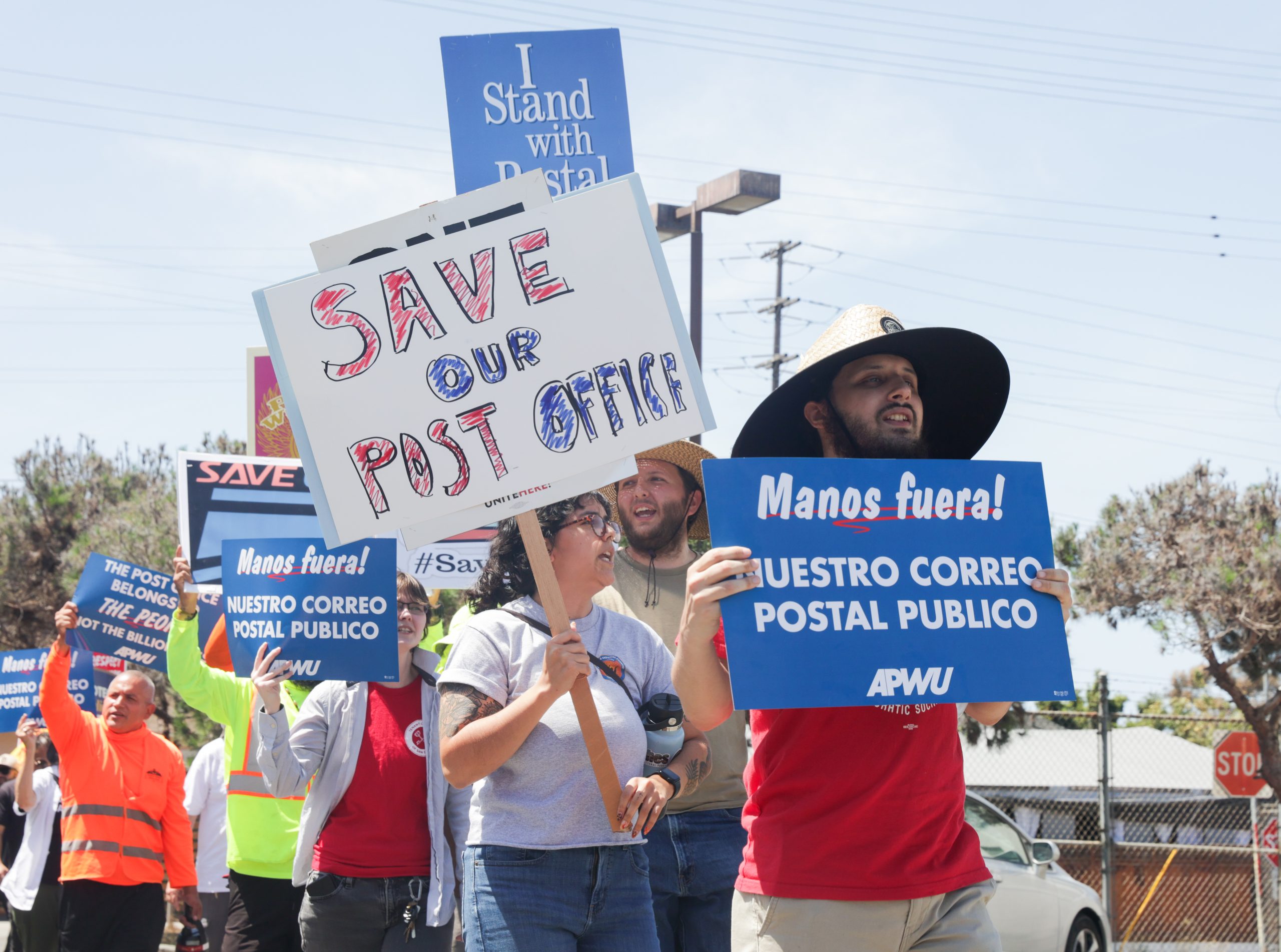 Residents protest over planned closure of Barrio Logan post office branch, joining nationwide demonstrations